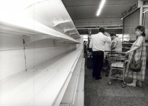 On the eve of the monetary union, shelves in GDR department stores are swept bare.