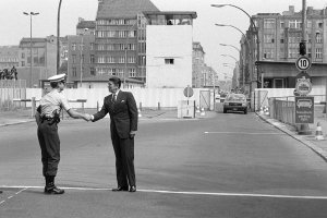 Ronald Reagan greets a US Army guard at Checkpoint Charlie, 1982.