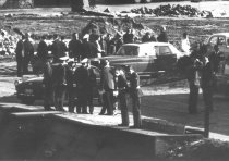 Paul Stretz, shot dead in the Berlin border waters: East German border troop photo – West Berlin police, firemen, customs agents and military police on the West Berlin bank of the Spandauer Schiffahrts Canal [April 29,1966]