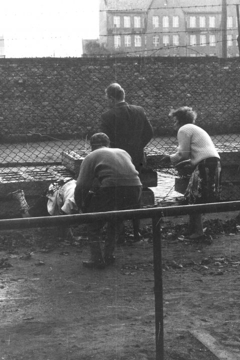 An East Berlin woman escapes to the West with the help of relatives, Neukölln, Berlin, 22 September 1961