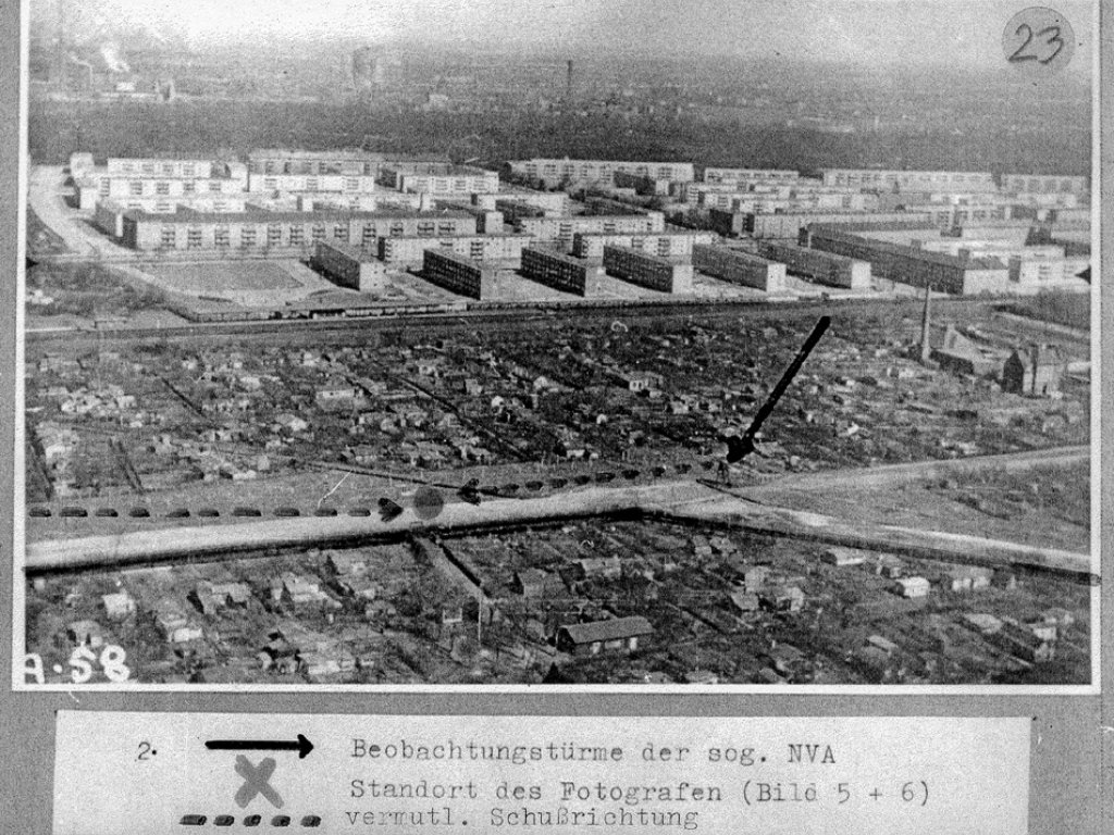 Lothar Schleusener, shot dead at the Berlin Wall: West Berlin police photo of the border territory between Berlin-Neukölln and Berlin-Treptow with direction of fired bullets marked [March 14, 1966]
