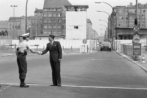 Ronald Reagan greets a US Army guard at Checkpoint Charlie, 1982.