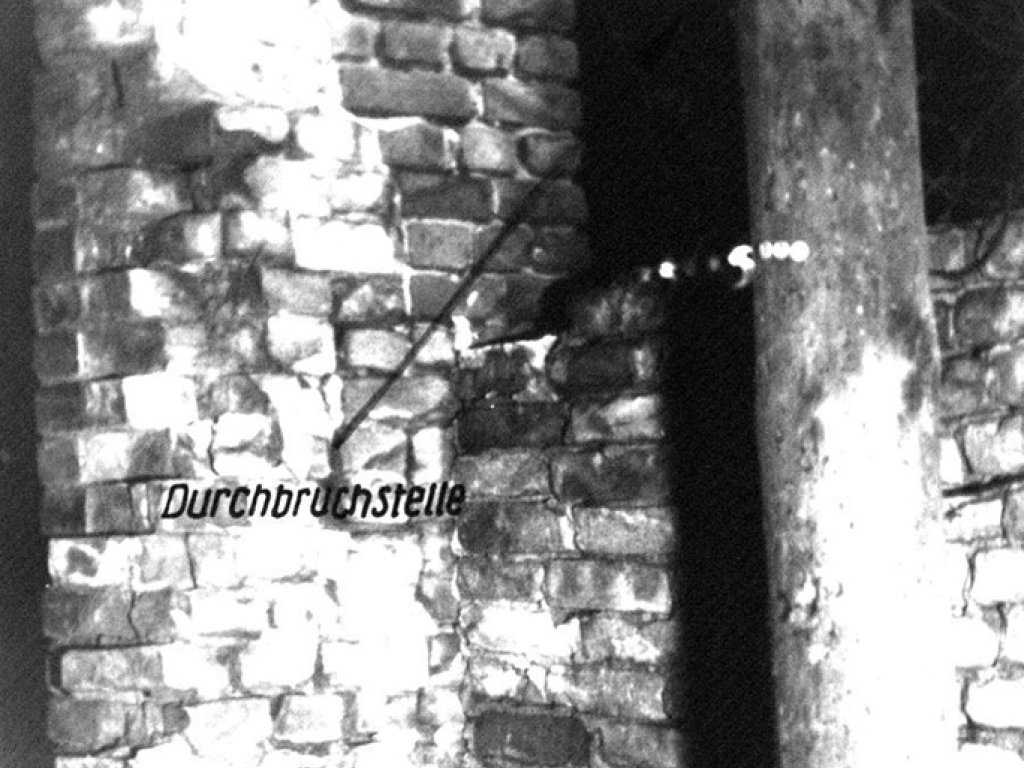 Unidentified fugitive, drowned in the Berlin border waters: East German border troop crime site photo of the escape route in Berlin-Friedrichshain [Jan. 19, 1965]