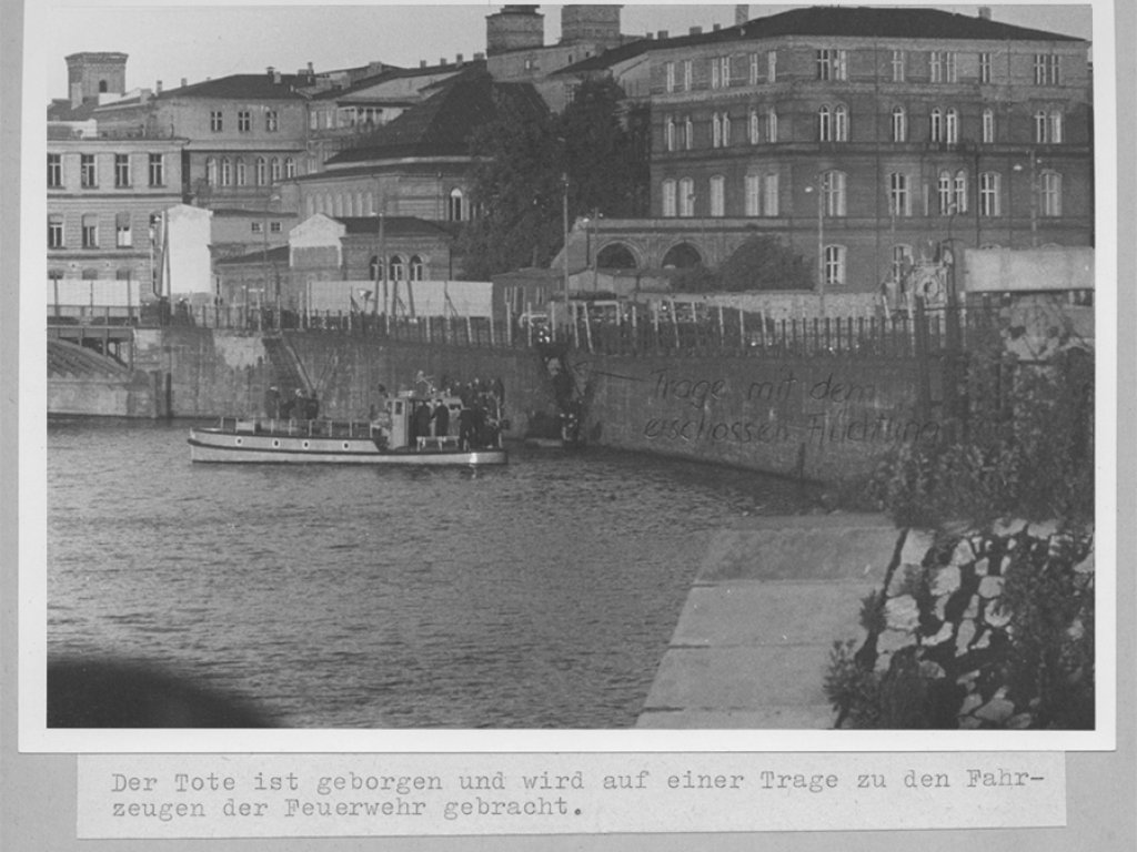 Axel Hannemann, shot dead in the Berlin border waters: West Berlin police crime site photo of East German border police retrieving Axel Hannemann from the Spree near the Reichstag building [June 5, 1962]