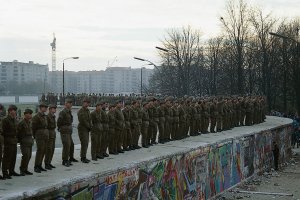 Border soldiers of the GDR have occupied the anti-tank wall to prevent people climbing it, 11 November 1989