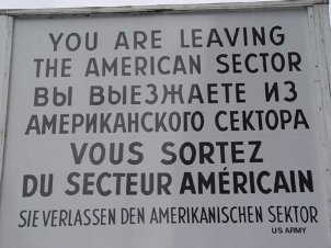 Border sign at the American Checkpoint Charlie in Berlin.