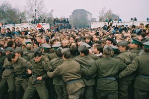 Shortly before the opening of the Wall: border guards hold West Berliners back at the Potsdam Square border crossing, 12 November 1989