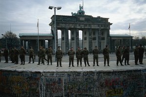 Border soldiers of the GDR have occupied the anti-tank wall to prevent people climbing it, 11 November 1989