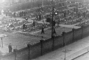 East Berliners visiting St. Hedwig’s Cemetery on Liesenstrasse are checked and observed by border police, 26 November 1961