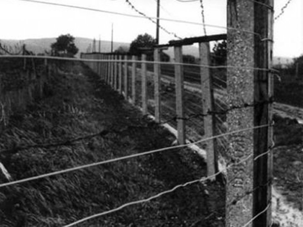 Barbed-wire fence with electric alarm system – an element of the Hungarian "Iron Curtain"