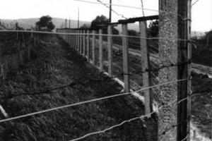 Barbed-wire fence with electric alarm system – an element of the Hungarian "Iron Curtain"