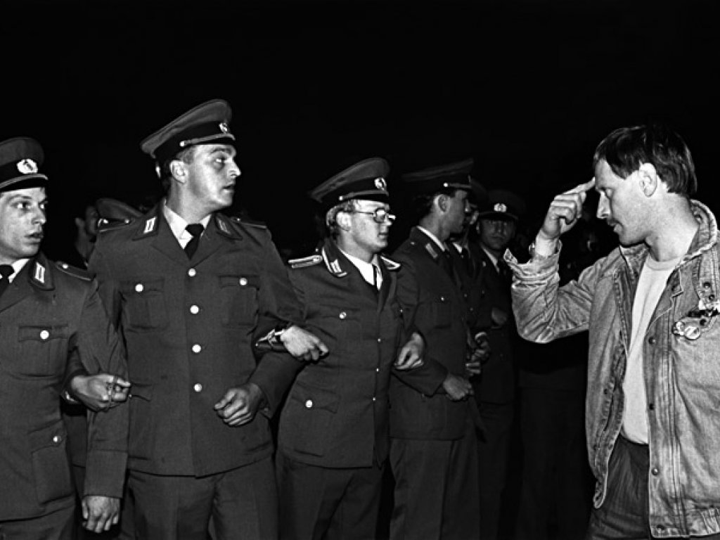 On the evening of the 40th anniversary of the founding of the GDR, thousands of people in the centre of East Berlin demonstrate for political reform